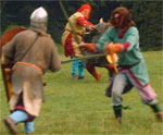 Re-enctors stage a battle between Vikings and Saxons